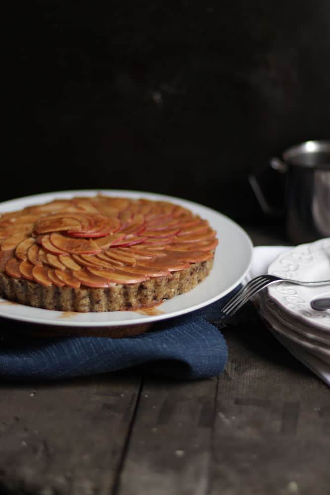 Apple pie on a white plate