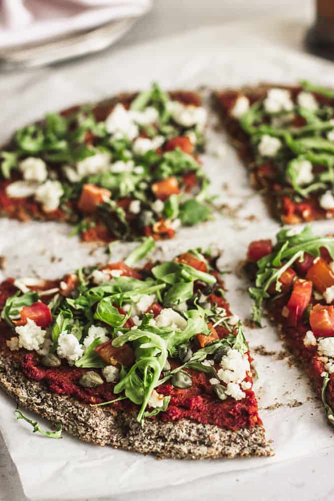 Pizza cut in four slices and spread apart