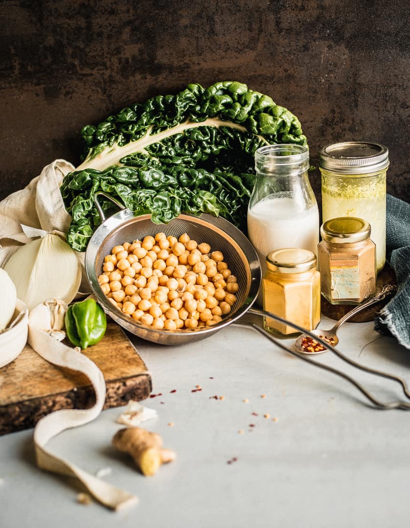 Chickpeas, chard, coconut milk, cumin, ginger, and vegetable stock to make a spiced chickpea stew