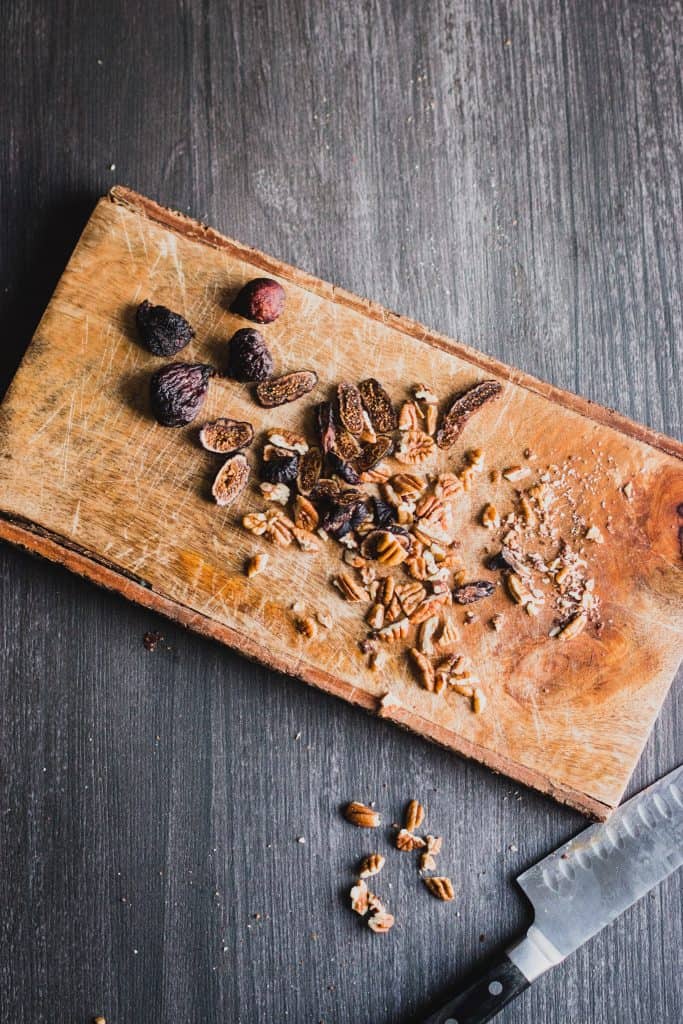 Top view of chopped dried figs and walnuts