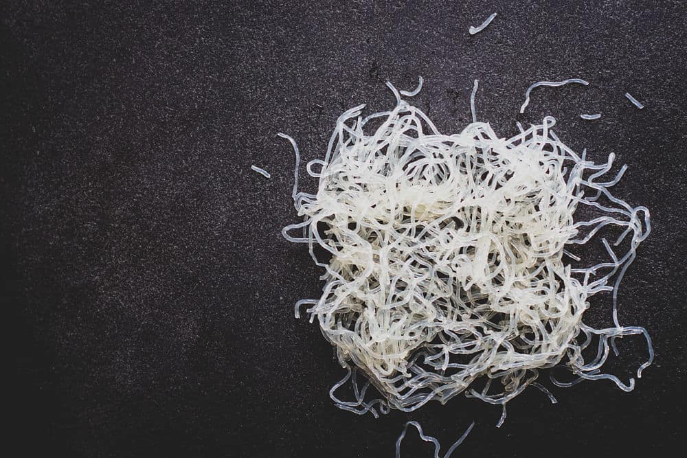 Top view of kelp noodles on a black surface