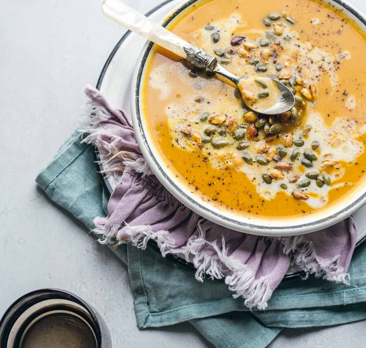 Butternut squash soup with carrots and ginger in a bowl