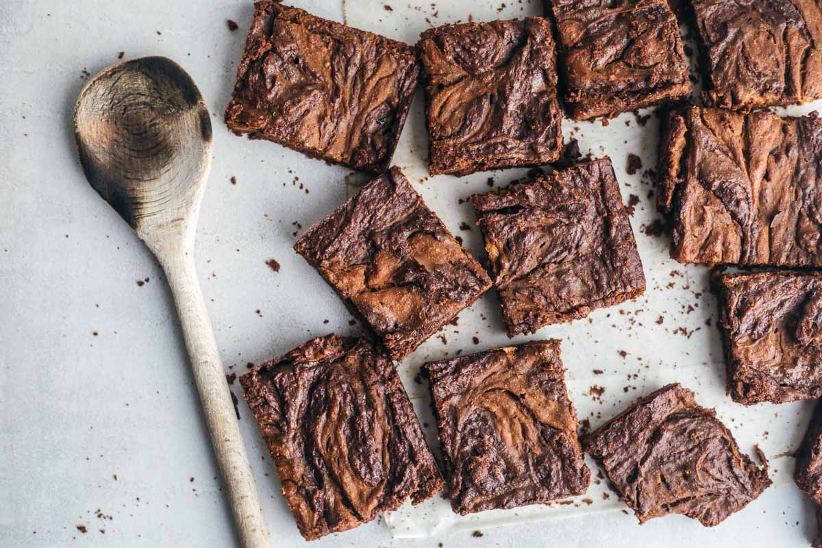 Squares of pumpkin brownies spread on a surface