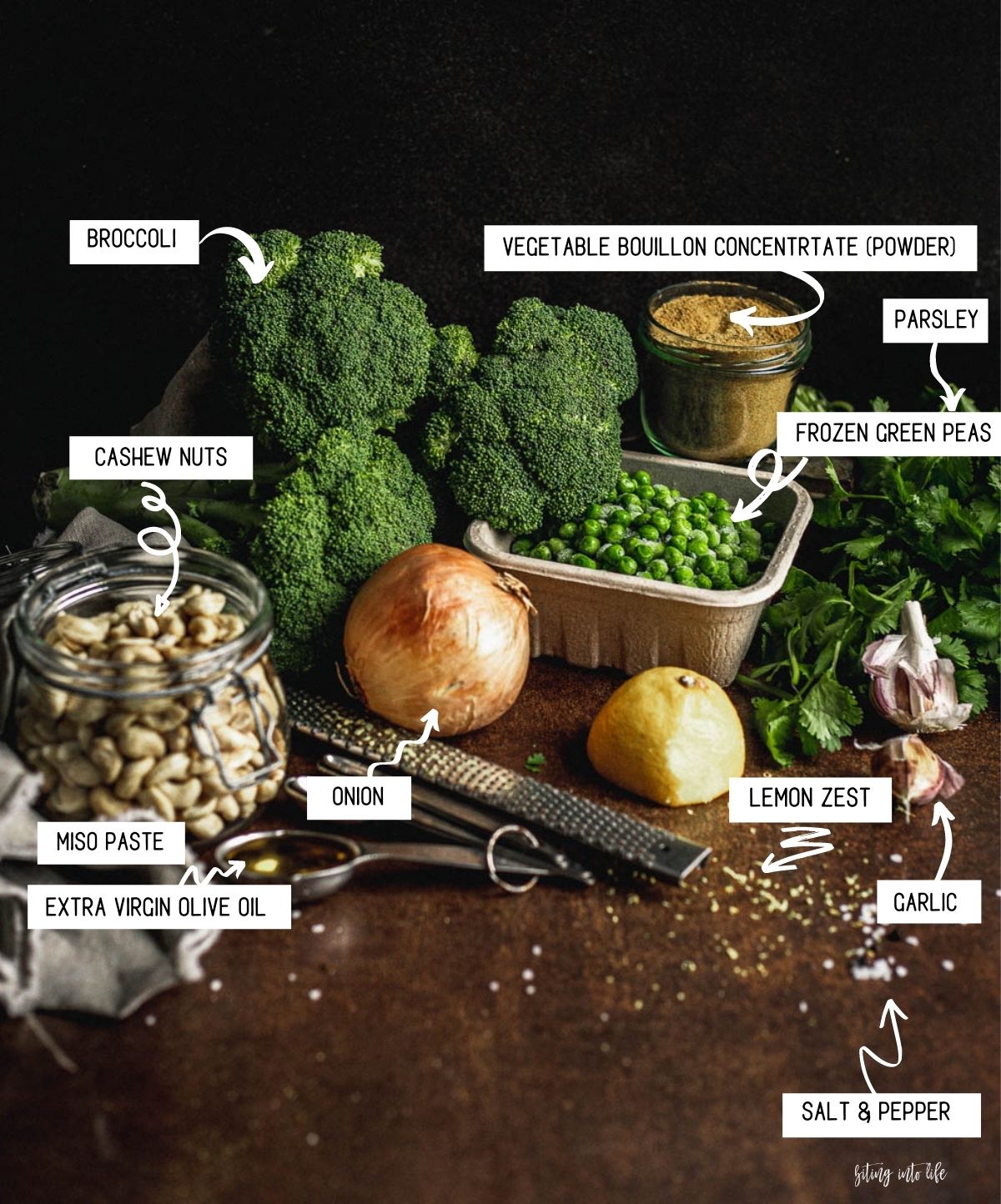 Ingredients spread out on a surface for broccoli and pea soup