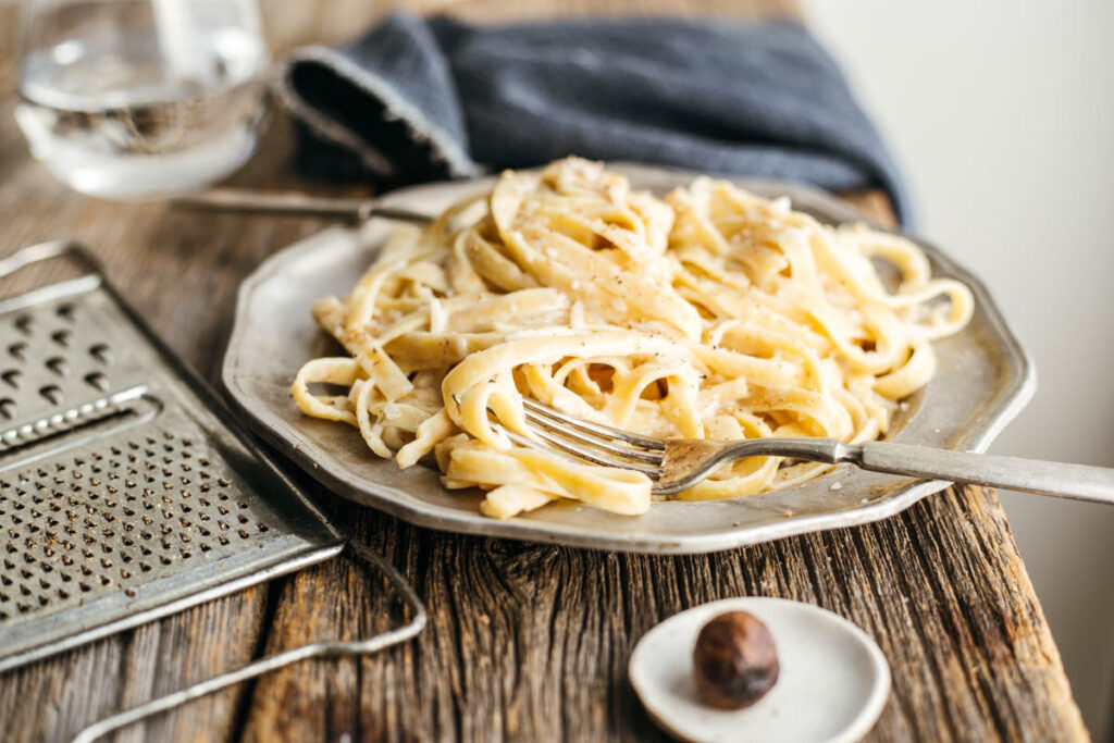 Simple and Creamy Coconut Milk Alfredo Sauce in Pasta Biting into Life